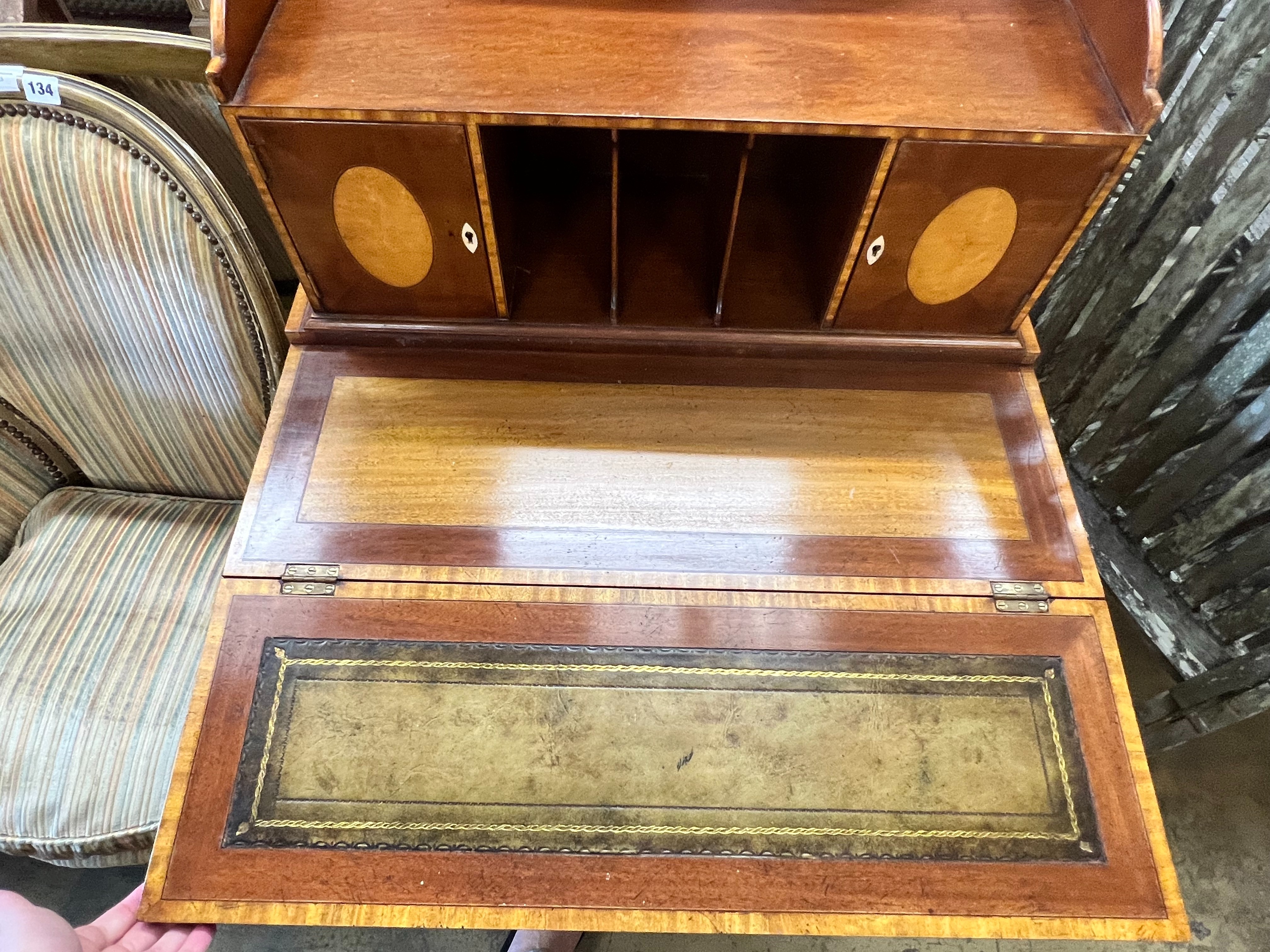 A reproduction Sheraton style crossbanded and satinwood mahogany bonheur du jour, by Arthur Brett, width 63cm depth 43cm height 111cm